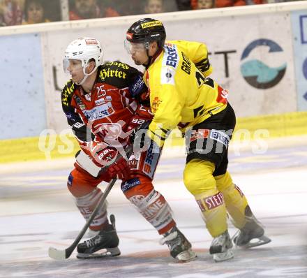 EBEL. Eishockey Bundesliga. KAC gegen UPC Vienna Capitals. Kirk Furey,  (KAC), Benoit Gratton (Caps). Klagenfurt, am 27.10.2013
Foto: Kuess 

---
pressefotos, pressefotografie, kuess, qs, qspictures, sport, bild, bilder, bilddatenbank