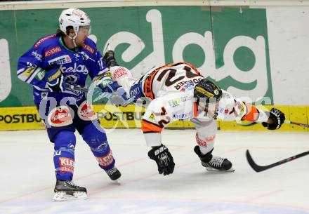 EBEL. Eishockey Bundesliga. EC VSV gegen Moser Medical Graz 99ers.  Brock McBride,  (VSV), Kevin Moderer (Graz). Villach, am 27.10..2013.
Foto: Kuess 


---
pressefotos, pressefotografie, kuess, qs, qspictures, sport, bild, bilder, bilddatenbank