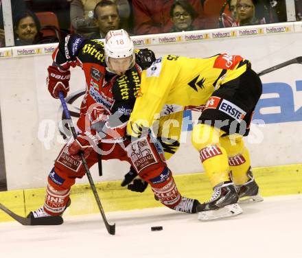 EBEL. Eishockey Bundesliga. KAC gegen UPC Vienna Capitals. Thomas Koch,  (KAC), Peter Schweda (Caps). Klagenfurt, am 27.10.2013
Foto: Kuess 

---
pressefotos, pressefotografie, kuess, qs, qspictures, sport, bild, bilder, bilddatenbank