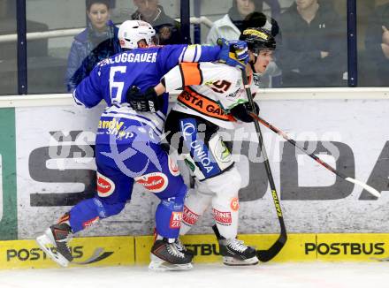 EBEL. Eishockey Bundesliga. EC VSV gegen Moser Medical Graz 99ers.  Gerhard Unterluggauer,  (VSV), Daniel Woger (Graz). Villach, am 27.10..2013.
Foto: Kuess 


---
pressefotos, pressefotografie, kuess, qs, qspictures, sport, bild, bilder, bilddatenbank