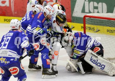 EBEL. Eishockey Bundesliga. EC VSV gegen Moser Medical Graz 99ers.  Cole Jarrett, Jean Philippe Lamoureux, (VSV), Daniel Woger  (Graz). Villach, am 27.10..2013.
Foto: Kuess 


---
pressefotos, pressefotografie, kuess, qs, qspictures, sport, bild, bilder, bilddatenbank