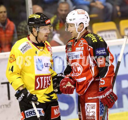 EBEL. Eishockey Bundesliga. KAC gegen UPC Vienna Capitals. Kirk Furey, (KAC), Jamie Fraser  (Caps).. Klagenfurt, am 25.10.2013
Foto: Kuess 

---
pressefotos, pressefotografie, kuess, qs, qspictures, sport, bild, bilder, bilddatenbank