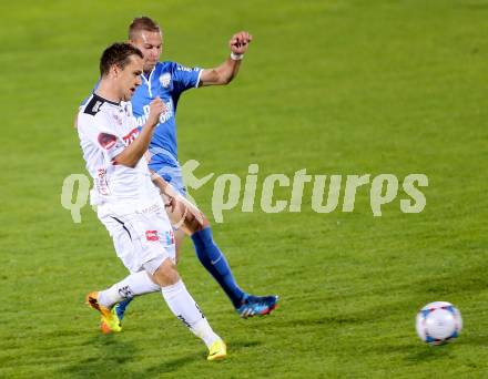 Fussball Bundesliga. RZ Pellets WAC gegen SV Scholz Groedig. Michael Liendl, (WAC), Peter Tschernegg (Groedig). Wolfsberg, 2.11.2013.
Foto: Kuess

---
pressefotos, pressefotografie, kuess, qs, qspictures, sport, bild, bilder, bilddatenbank