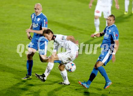 Fussball Bundesliga. RZ Pellets WAC gegen SV Scholz Groedig. Christian Falk, (WAC), Hannes Sigurdsson, Peter Tschernegg (Groedig). Wolfsberg, 2.11.2013.
Foto: Kuess

---
pressefotos, pressefotografie, kuess, qs, qspictures, sport, bild, bilder, bilddatenbank