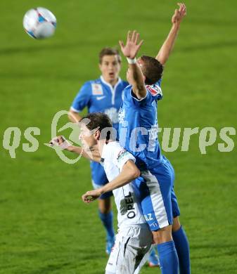 Fussball Bundesliga. RZ Pellets WAC gegen SV Scholz Groedig. Christian Falk,  (WAC), Peter Tschernegg (Groedig). Wolfsberg, 2.11.2013.
Foto: Kuess

---
pressefotos, pressefotografie, kuess, qs, qspictures, sport, bild, bilder, bilddatenbank