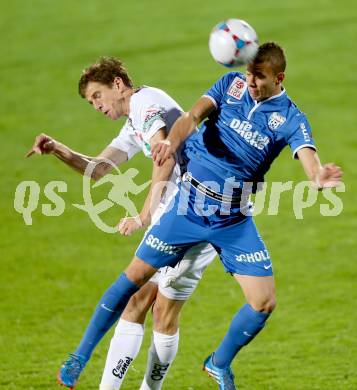 Fussball Bundesliga. RZ Pellets WAC gegen SV Scholz Groedig. Christian Falk, (WAC), Peter Tschernegg (Groedig). Wolfsberg, 2.11.2013.
Foto: Kuess

---
pressefotos, pressefotografie, kuess, qs, qspictures, sport, bild, bilder, bilddatenbank