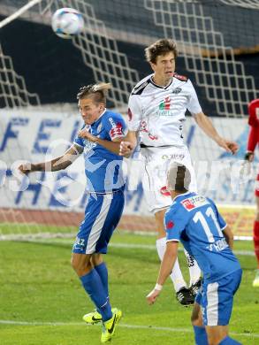 Fussball Bundesliga. RZ Pellets WAC gegen SV Scholz Groedig. Christian Falk, (WAC),  Dominique Taboga (Groedig). Wolfsberg, 2.11.2013.
Foto: Kuess

---
pressefotos, pressefotografie, kuess, qs, qspictures, sport, bild, bilder, bilddatenbank