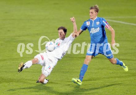 Fussball Bundesliga. RZ Pellets WAC gegen SV Scholz Groedig. Christian Falk, (WAC), Dominique Taboga  (Groedig). Wolfsberg, 2.11.2013.
Foto: Kuess

---
pressefotos, pressefotografie, kuess, qs, qspictures, sport, bild, bilder, bilddatenbank