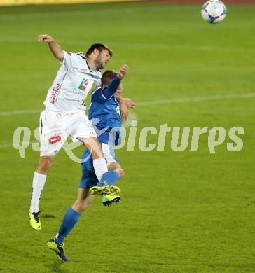 Fussball Bundesliga. RZ Pellets WAC gegen SV Scholz Groedig. Nemanja Rnic,  (WAC), Tadej Trdina (Groedig). Wolfsberg, 2.11.2013.
Foto: Kuess

---
pressefotos, pressefotografie, kuess, qs, qspictures, sport, bild, bilder, bilddatenbank