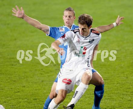 Fussball Bundesliga. RZ Pellets WAC gegen SV Scholz Groedig. Christian Falk, (WAC), Peter Tschernegg (Groedig). Wolfsberg, 2.11.2013.
Foto: Kuess

---
pressefotos, pressefotografie, kuess, qs, qspictures, sport, bild, bilder, bilddatenbank