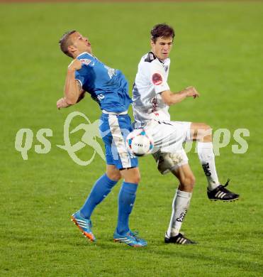 Fussball Bundesliga. RZ Pellets WAC gegen SV Scholz Groedig. Christian Falk, (WAC), Peter Tschernegg (Groedig). Wolfsberg, 2.11.2013.
Foto: Kuess

---
pressefotos, pressefotografie, kuess, qs, qspictures, sport, bild, bilder, bilddatenbank