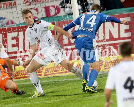 Fussball Bundesliga. RZ Pellets WAC gegen SV Scholz Groedig. Michael Sollbauer, (WAC), Philipp Zulechner (Groedig). Wolfsberg, 2.11.2013.
Foto: Kuess

---
pressefotos, pressefotografie, kuess, qs, qspictures, sport, bild, bilder, bilddatenbank