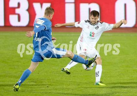 Fussball Bundesliga. RZ Pellets WAC gegen SV Scholz Groedig. Nemanja Rnic, (WAC), Tadej Trdina  (Groedig). Wolfsberg, 2.11.2013.
Foto: Kuess

---
pressefotos, pressefotografie, kuess, qs, qspictures, sport, bild, bilder, bilddatenbank