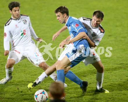 Fussball Bundesliga. RZ Pellets WAC gegen SV Scholz Groedig. Michele Polverino, Nemanja Rnic, (WAC), Correa Miranda Tomas Esteban (Groedig). Wolfsberg, 2.11.2013.
Foto: Kuess

---
pressefotos, pressefotografie, kuess, qs, qspictures, sport, bild, bilder, bilddatenbank