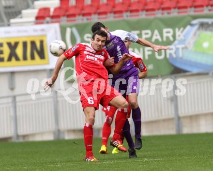 Fussball. Regionalliga. Austria Klagenfurt gegen Vorwaerts Steyr. Raul Garcia Lozano (Austria Klagenfurt), Goran Aleksic (Vorwaerts Steyr). Klagenfurt, 2.11.2013.
Foto: Kuess 
---
pressefotos, pressefotografie, kuess, qs, qspictures, sport, bild, bilder, bilddatenbank