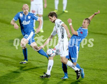 Fussball Bundesliga. RZ Pellets WAC gegen SV Scholz Groedig. Christian Falk, (WAC), Hannes Sigurdsson, Peter Tschernegg (Groedig).. Wolfsberg, 2.11.2013.
Foto: Kuess

---
pressefotos, pressefotografie, kuess, qs, qspictures, sport, bild, bilder, bilddatenbank