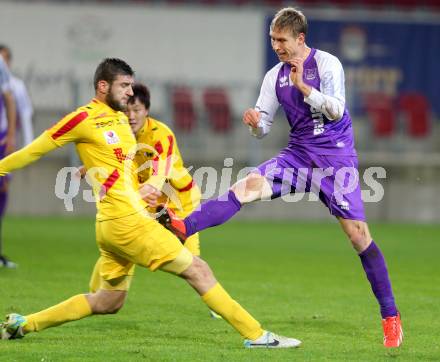 Fussball Regionalliga. SK Austria klagenfurt gegen KSV Amateure. David Poljanec, (Austria Klagenfurt), Argzim Redzovic (KSV Amateure). Klagenfurt, 8.11.2013.
Foto: Kuess
---
pressefotos, pressefotografie, kuess, qs, qspictures, sport, bild, bilder, bilddatenbank