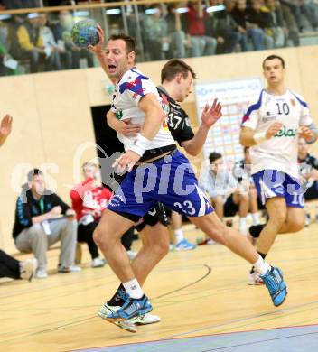 Handball HLA. SC Ferlach gegen Bregenz. Boris Vodisek, (Ferlach),  Gernot Watzl  (Bregenz). Ferlach, 9.11.2013.
Foto: Kuess
---
pressefotos, pressefotografie, kuess, qs, qspictures, sport, bild, bilder, bilddatenbank