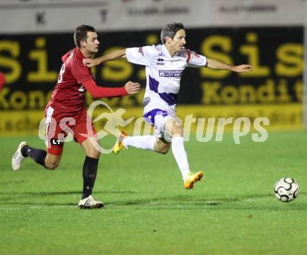 Fussball Regionalliga. SAK gegen St. Florian. Thomas Riedl, (SAK), Michael Kogler  (St.Florian). Welzenegg, am 12.11.2013.
Foto: Kuess
---
pressefotos, pressefotografie, kuess, qs, qspictures, sport, bild, bilder, bilddatenbank