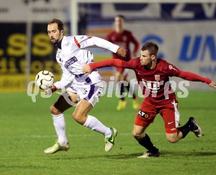 Fussball Regionalliga. SAK gegen St. Florian. Marjan Kropiunik,  (SAK), Roland Hinterreiter (St.Florian). Welzenegg, am 12.11.2013.
Foto: Kuess
---
pressefotos, pressefotografie, kuess, qs, qspictures, sport, bild, bilder, bilddatenbank