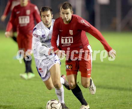 Fussball Regionalliga. SAK gegen St. Florian.  Murat Veliu, (SAK), Michael Kogler (St.Florian). Welzenegg, am 12.11.2013.
Foto: Kuess
---
pressefotos, pressefotografie, kuess, qs, qspictures, sport, bild, bilder, bilddatenbank