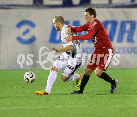 Fussball Regionalliga. SAK gegen St. Florian. Christian Dlopst,  (SAK), Thomas Hoeltschl (St.Florian).. Welzenegg, am 12.11.2013.
Foto: Kuess
---
pressefotos, pressefotografie, kuess, qs, qspictures, sport, bild, bilder, bilddatenbank