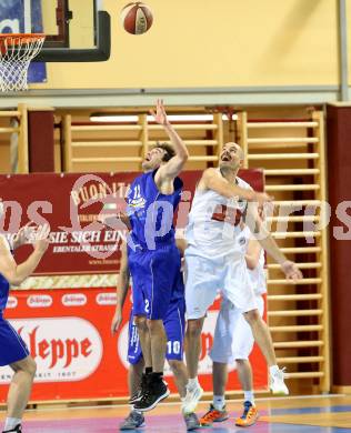 Basketball. 2. Bundesliga. Woerthersee Piraten gegen Radenthein. Joachim Buggelsheim,  (Piraten), Peter GLEISSNER (Radenthein). Klagenfurt, am 16.11.2013.
Foto: Kuess
---
pressefotos, pressefotografie, kuess, qs, qspictures, sport, bild, bilder, bilddatenbank