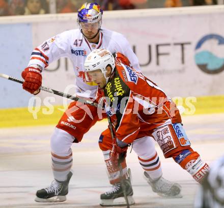 EBEL. Eishockey Bundesliga. KAC gegen EC Red Bull Salzburg.  Thomas Koch, (KAC), Evan Brophey (Salzburg). Klagenfurt, am 22.11.2013
Foto: Kuess 

---
pressefotos, pressefotografie, kuess, qs, qspictures, sport, bild, bilder, bilddatenbank