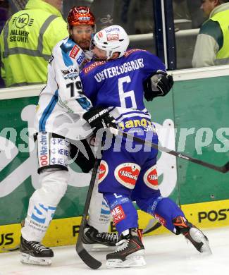 EBEL. Eishockey Bundesliga. EC VSV gegen EHC LIWEST Linz.  Gerhard Unterluggauer, (VSV), Gregor Baumgartner (Linz). Villach, am 24.11.2013.
Foto: Kuess 


---
pressefotos, pressefotografie, kuess, qs, qspictures, sport, bild, bilder, bilddatenbank