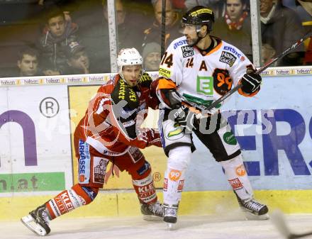 EBEL. Eishockey Bundesliga. KAC gegen Moser Medical Graz 99ers.  Thomas Koch, (KAC), Guillaume Lefebvre (Graz). Klagenfurt, am 1.12.2013
Foto: Kuess 

---
pressefotos, pressefotografie, kuess, qs, qspictures, sport, bild, bilder, bilddatenbank