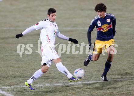 Fussball Bundesliga. RZ Pellets WAC gegen FC Red Bull Salzburg. Roland Putsche, (WAC), Ramalho Silva Andre (Salzburg). Wolfsberg, 4.12.2013.
Foto: Kuess

---
pressefotos, pressefotografie, kuess, qs, qspictures, sport, bild, bilder, bilddatenbank