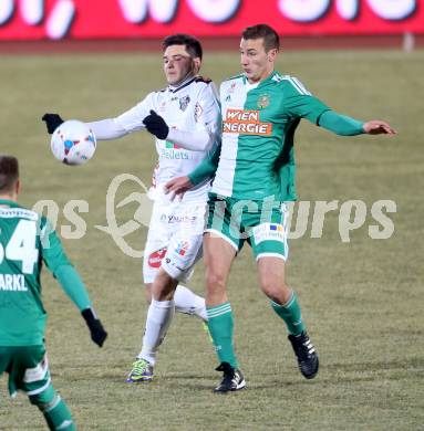 Fussball Bundesliga. RZ Pellets WAC gegen SK Rapid Wien. Roland Putsche, (WAC), Dominik Wydra (Rapid). Wolfsberg, 8.12.2013.
Foto: Kuess

---
pressefotos, pressefotografie, kuess, qs, qspictures, sport, bild, bilder, bilddatenbank