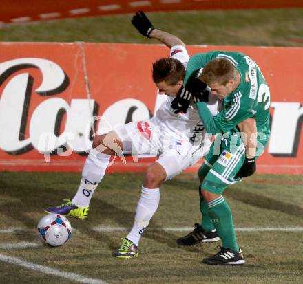 Fussball Bundesliga. RZ Pellets WAC gegen SK Rapid Wien. Sandro Gotal, (WAC), Dominik Starkl (Rapid). Wolfsberg, 8.12.2013.
Foto: Kuess

---
pressefotos, pressefotografie, kuess, qs, qspictures, sport, bild, bilder, bilddatenbank