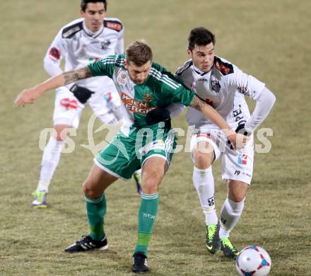 Fussball Bundesliga. RZ Pellets WAC gegen SK Rapid Wien. Roland Putsche, (WAC), Guido Burgstaller (Rapid).. Wolfsberg, 8.12.2013.
Foto: Kuess

---
pressefotos, pressefotografie, kuess, qs, qspictures, sport, bild, bilder, bilddatenbank