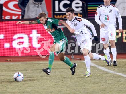 Fussball Bundesliga. RZ Pellets WAC gegen SK Rapid Wien. Roland Putsche, (WAC), Guido Burgstaller (Rapid). Wolfsberg, 8.12.2013.
Foto: Kuess

---
pressefotos, pressefotografie, kuess, qs, qspictures, sport, bild, bilder, bilddatenbank