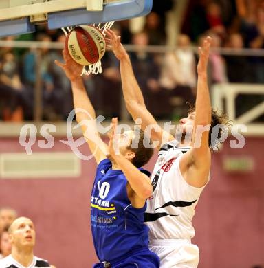 Basketball 2. Bundesliga. ASKOE Villach Raiders gegen WSG Raiffeisen Radenthein. Blaz Lobe (Villach), Matej Pirija (Radenthein). Villach, am 7.12.2013.
Foto: Kuess
---
pressefotos, pressefotografie, kuess, qs, qspictures, sport, bild, bilder, bilddatenbank