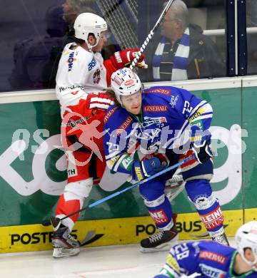 EBEL. Eishockey Bundesliga. EC VSV gegen HCB Suedtirol Bozen.  John Hughes,  (VSV), Rok Pajic (Bozen).  Villach, am 10.12.2013.
Foto: Kuess 


---
pressefotos, pressefotografie, kuess, qs, qspictures, sport, bild, bilder, bilddatenbank