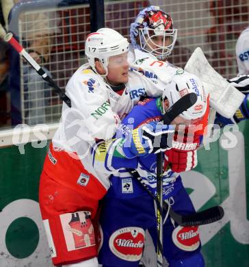 EBEL. Eishockey Bundesliga. EC VSV gegen HCB Suedtirol Bozen. Cole Jarrett, (VSV), Alexander Egger, Jaroslav Huebl  (Bozen). Villach, am 10.12.2013.
Foto: Kuess 


---
pressefotos, pressefotografie, kuess, qs, qspictures, sport, bild, bilder, bilddatenbank