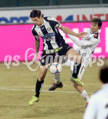 Fussball Bundesliga. RZ Pellets WAC gegen SK Puntigamer Sturm Graz.. Joachim Standfest, (WAC), Nikola Vujadinovic (Graz). Wolfsberg, 11.12.2013.
Foto: Kuess

---
pressefotos, pressefotografie, kuess, qs, qspictures, sport, bild, bilder, bilddatenbank