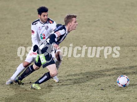 Fussball Bundesliga. RZ Pellets WAC gegen SK Puntigamer Sturm Graz.. Michele Polverino, (WAC), Marc Andre Schmerboeck (Graz). Wolfsberg, 11.12.2013.
Foto: Kuess

---
pressefotos, pressefotografie, kuess, qs, qspictures, sport, bild, bilder, bilddatenbank