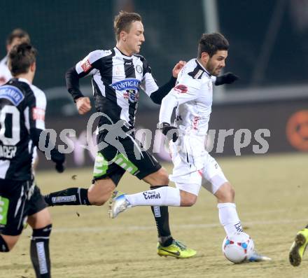 Fussball Bundesliga. RZ Pellets WAC gegen SK Puntigamer Sturm Graz.. Michele Polverino, (WAC), David Beichler (Graz). Wolfsberg, 11.12.2013.
Foto: Kuess

---
pressefotos, pressefotografie, kuess, qs, qspictures, sport, bild, bilder, bilddatenbank