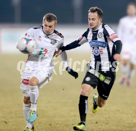 Fussball Bundesliga. RZ Pellets WAC gegen SK Puntigamer Sturm Graz.. Manuel Kerhe, (WAC), David Schloffer (Graz). Wolfsberg, 11.12.2013.
Foto: Kuess

---
pressefotos, pressefotografie, kuess, qs, qspictures, sport, bild, bilder, bilddatenbank