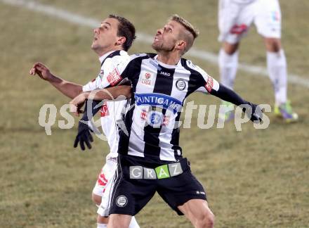 Fussball Bundesliga. RZ Pellets WAC gegen SK Puntigamer Sturm Graz.. Michael Liendl,  (WAC), Patrick Wolf (Graz). Wolfsberg, 11.12.2013.
Foto: Kuess

---
pressefotos, pressefotografie, kuess, qs, qspictures, sport, bild, bilder, bilddatenbank