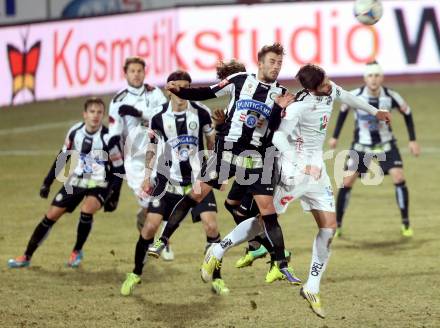 Fussball Bundesliga. RZ Pellets WAC gegen SK Puntigamer Sturm Graz.. Lucas Segovia Daniel, (WAC), Philipp Huetter (Graz). Wolfsberg, 11.12.2013.
Foto: Kuess

---
pressefotos, pressefotografie, kuess, qs, qspictures, sport, bild, bilder, bilddatenbank