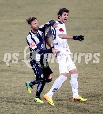 Fussball Bundesliga. RZ Pellets WAC gegen SK Puntigamer Sturm Graz.. Mihret Topcagic, (WAC), Michael Madl (Graz). Wolfsberg, 11.12.2013.
Foto: Kuess

---
pressefotos, pressefotografie, kuess, qs, qspictures, sport, bild, bilder, bilddatenbank