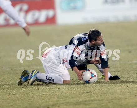 Fussball Bundesliga. RZ Pellets WAC gegen SK Puntigamer Sturm Graz.. Michele Polverino, (WAC), David Schloffer (Graz). Wolfsberg, 11.12.2013.
Foto: Kuess

---
pressefotos, pressefotografie, kuess, qs, qspictures, sport, bild, bilder, bilddatenbank