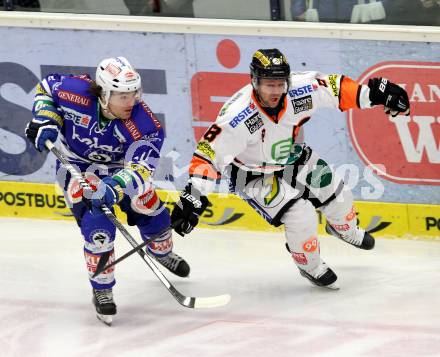 EBEL. Eishockey Bundesliga. EC VSV gegen Moser Medical Graz 99ers.  Brock McBride, (VSV), Roland Kaspitz (Graz). Villach, am 15.12.2013.
Foto: Kuess 


---
pressefotos, pressefotografie, kuess, qs, qspictures, sport, bild, bilder, bilddatenbank