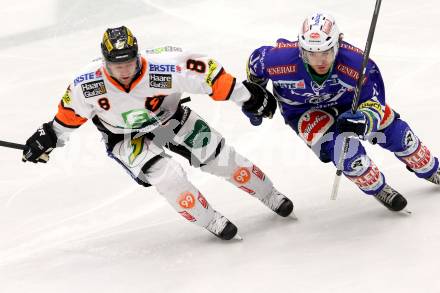 EBEL. Eishockey Bundesliga. EC VSV gegen Moser Medical Graz 99ers.  Brock McBride, (VSV), Roland Kaspitz (Graz). . Villach, am 15.12.2013.
Foto: Kuess 


---
pressefotos, pressefotografie, kuess, qs, qspictures, sport, bild, bilder, bilddatenbank