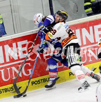 EBEL. Eishockey Bundesliga. EC VSV gegen Moser Medical Graz 99ers.  John Hughes, (VSV), Patrick Coulombe (Graz). Villach, am 15.12.2013.
Foto: Kuess 


---
pressefotos, pressefotografie, kuess, qs, qspictures, sport, bild, bilder, bilddatenbank