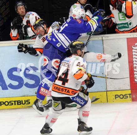 EBEL. Eishockey Bundesliga. EC VSV gegen Moser Medical Graz 99ers.  Curtis Fraser, (VSV), Patrick Coulombe (Graz). Villach, am 15.12.2013.
Foto: Kuess 


---
pressefotos, pressefotografie, kuess, qs, qspictures, sport, bild, bilder, bilddatenbank